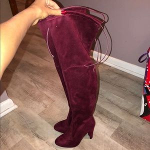 Red heel thigh high boots